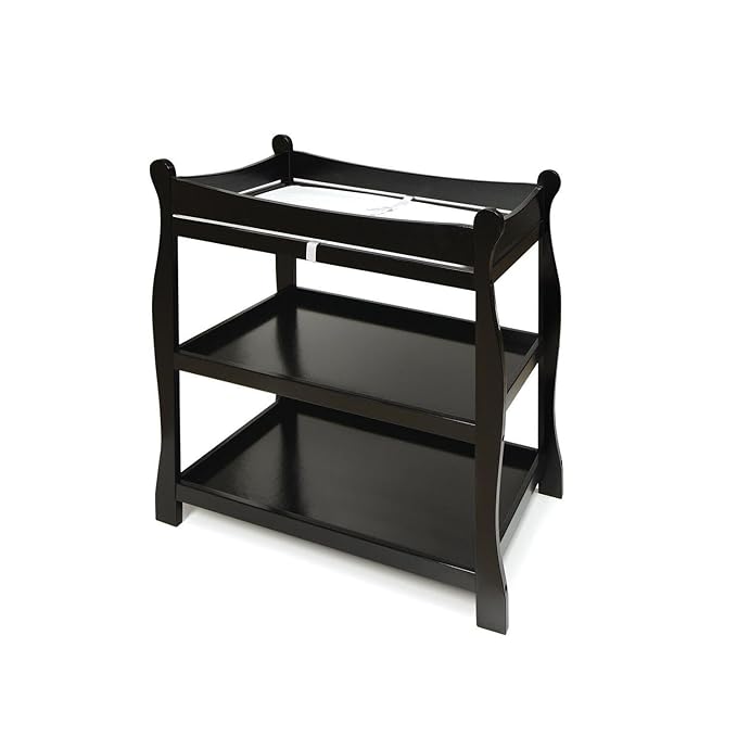 Badger Basket Sleigh Style Baby Changing Table - Nursery Diaper Station with Safety Rails, Foam Pad, and Two Storage Shelves - Nursery Organizer - Black