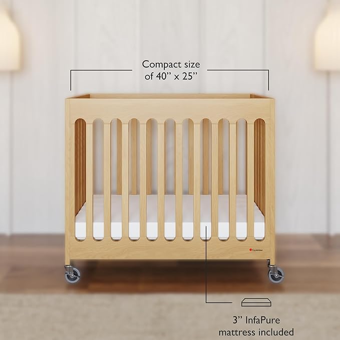 Foundations Boutique Folding Mini Baby Crib - Compact, Portable, Wooden Hotel Crib, Foldable Mini Cribs for Baby & Toddlers - Includes 3" Foam Mattress - Natural