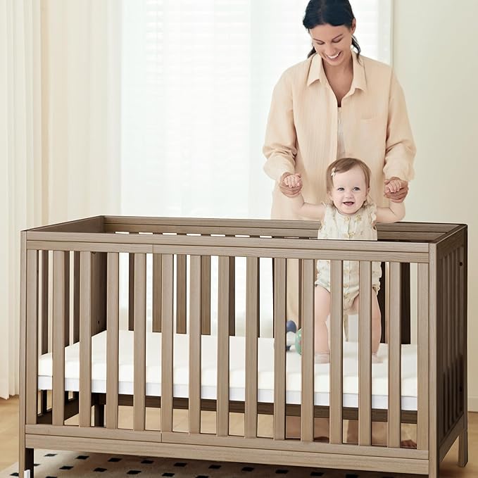 EvoNest Baby Crib, 11 in 1 Convertible Mini Crib with Wheels, 100% New Zealand Wood Growing Bed, 4 Adjustable Mattress Height ，Walnut Brown