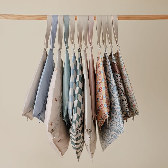 mushie Water Resistant Wet Bags | Large & Small Reusable Storage Bag for Baby Items and Travel | Zippered Pockets with Handle | Machine Washable, Set of 2 (Happy Flowers Check)